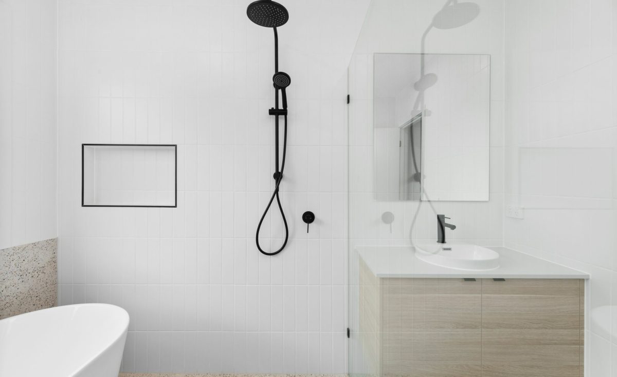 White bathroom with black accents