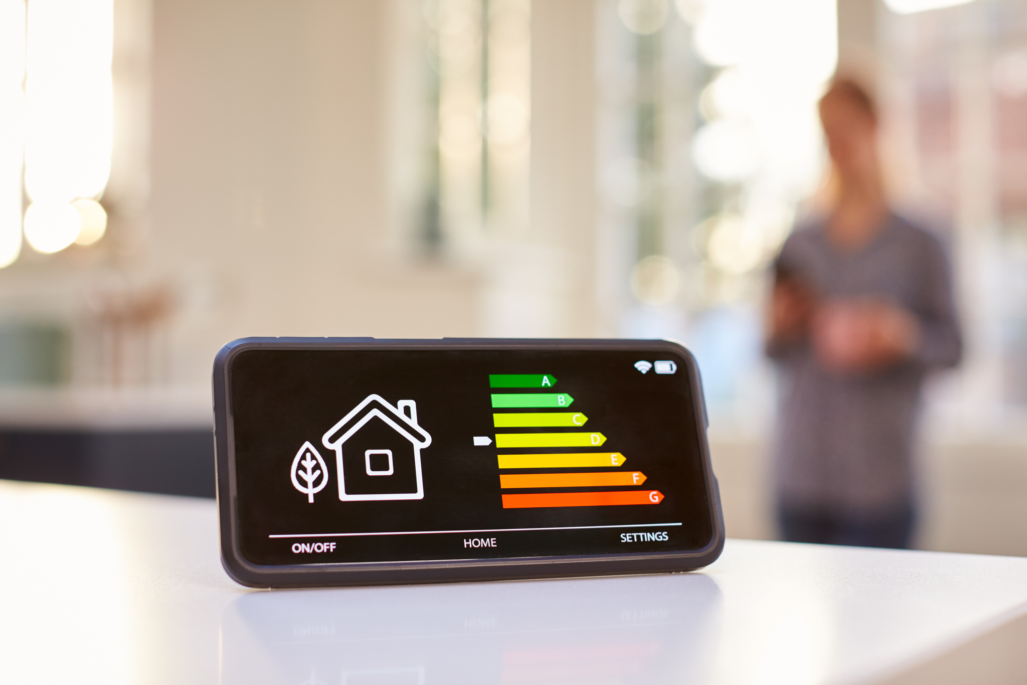 Smart energy meter in kitchen measuring energy efficiency 